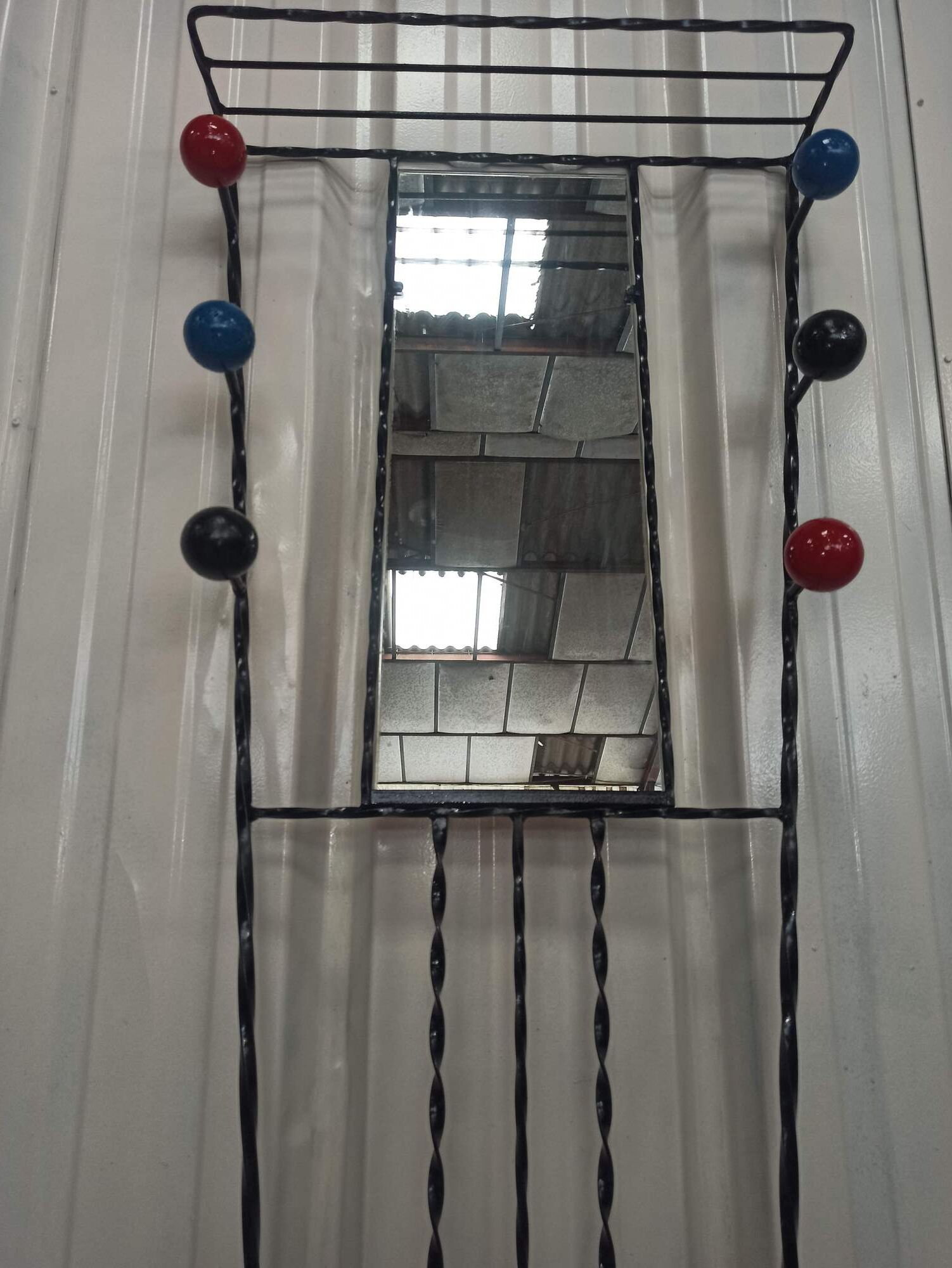 Iron cloakroom wall-mounted port multicolored balls mirror door umbrellas hats circa 50