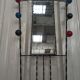 Iron cloakroom wall-mounted port multicolored balls mirror door umbrellas hats circa 50