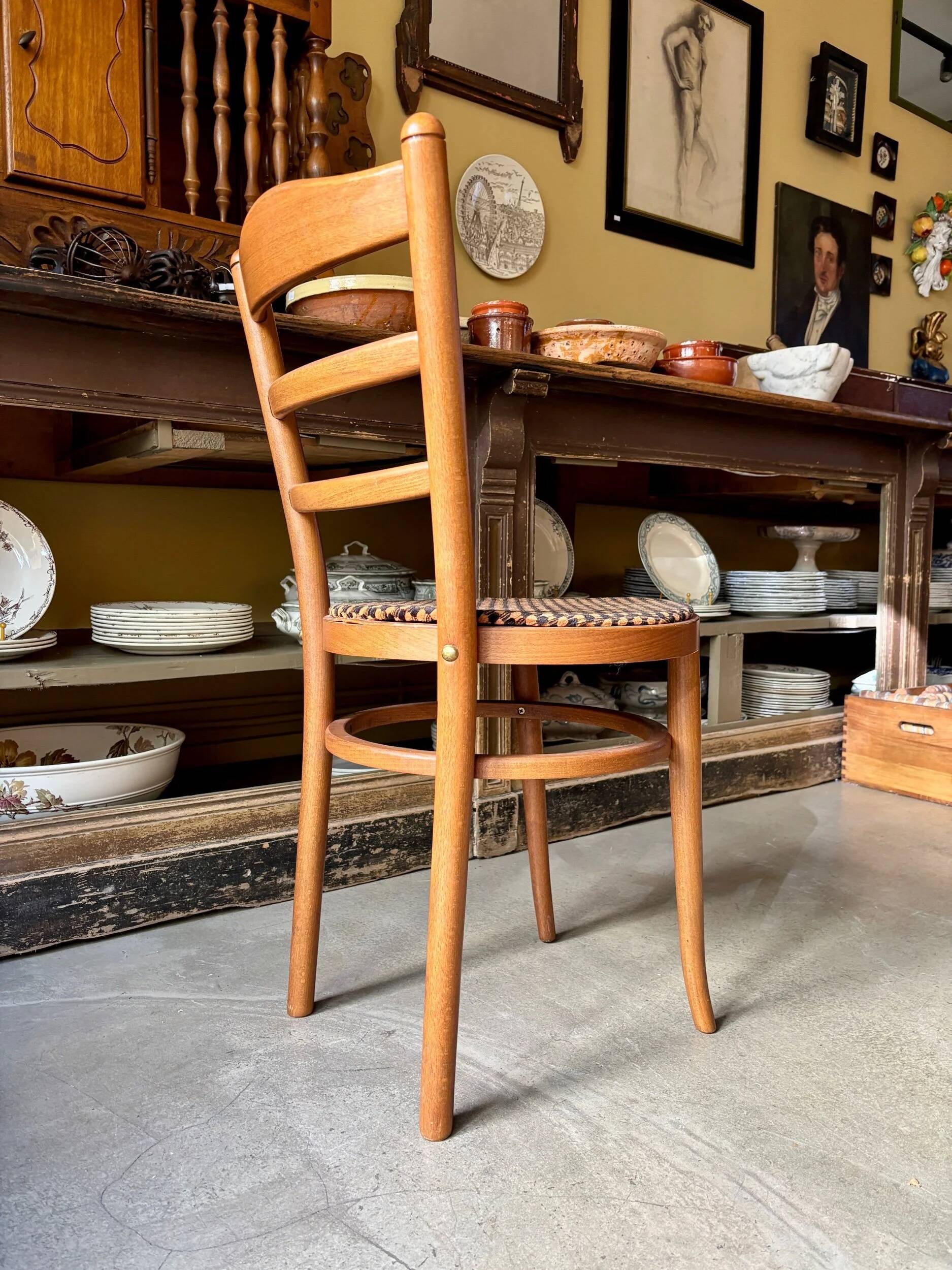 Baumann bistro chair in beech and orange and black geometric cotton