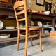 Baumann bistro chair in beech and orange and black geometric cotton