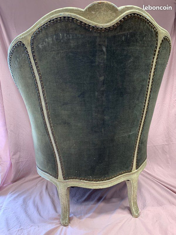 Green velvet shepherdess armchair
