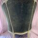 Green velvet shepherdess armchair