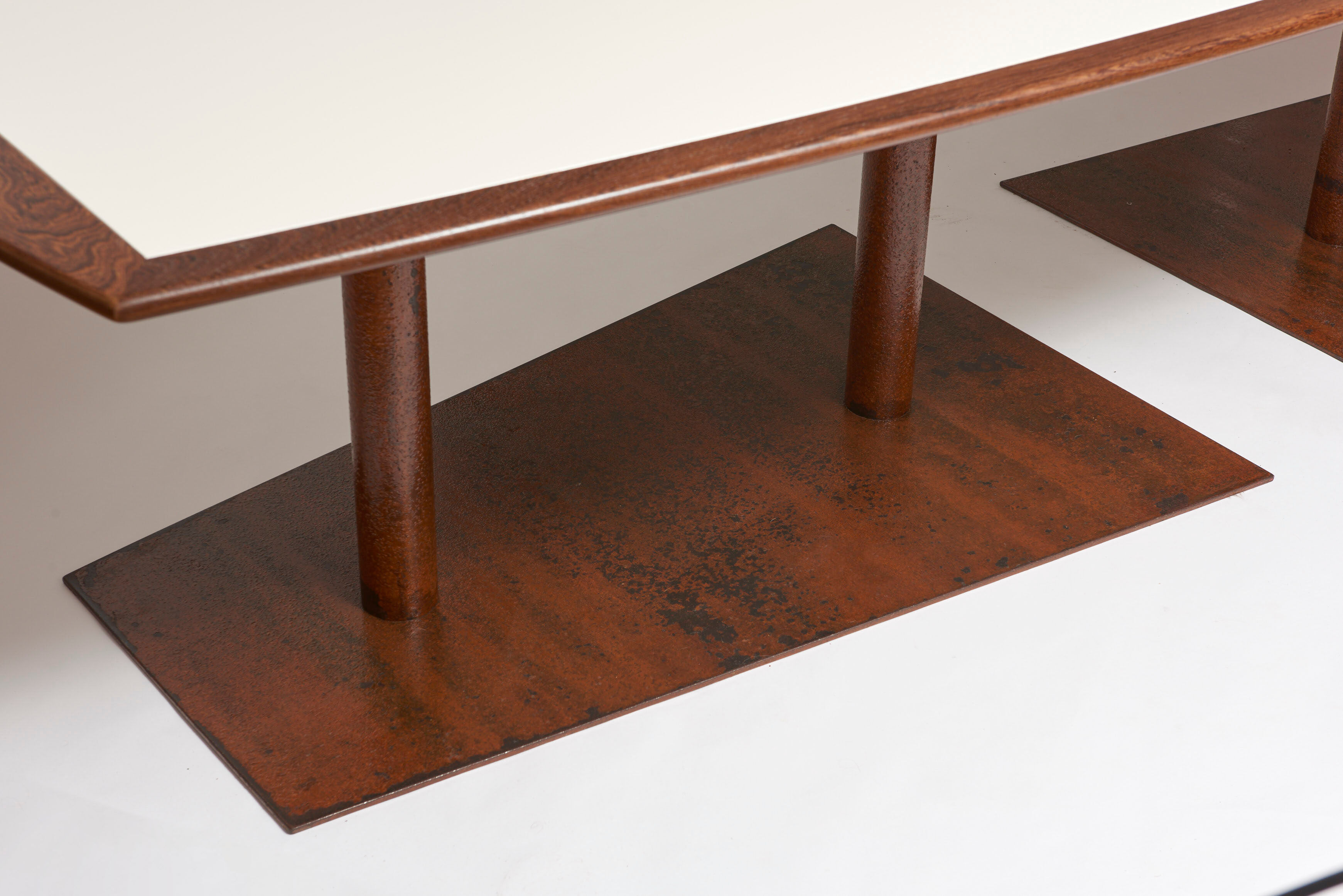Brutalist conference table made of wood and steel