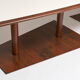 Brutalist conference table made of wood and steel