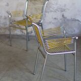 Two Rene Herbst Infabrica style Bungee armchairs