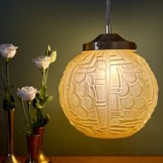 Suspension globe vintage art déco en verre dépoli jaune