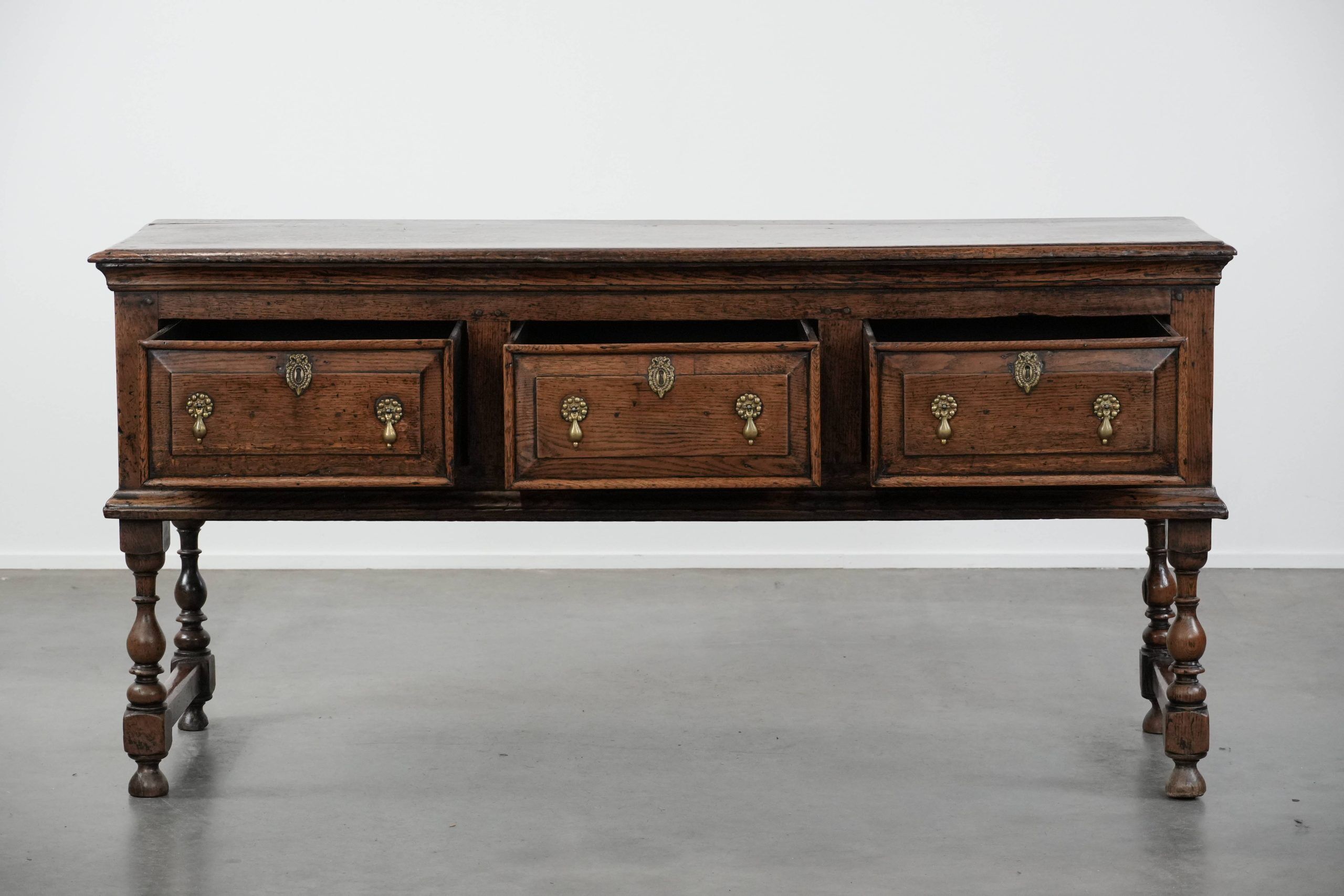 Antique English sideboard from the early 18th century made of oak