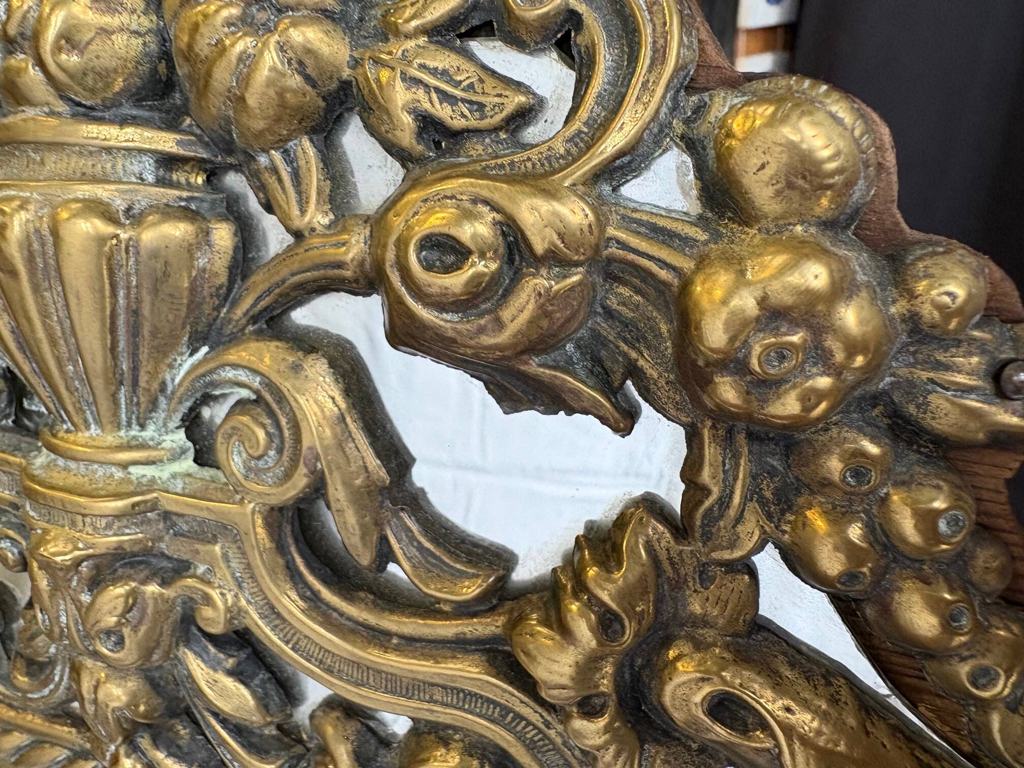 Napoleon III style mirror with gilt brass side panels