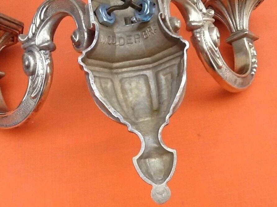 Large wall sconce in LXV style, patinated bronze.