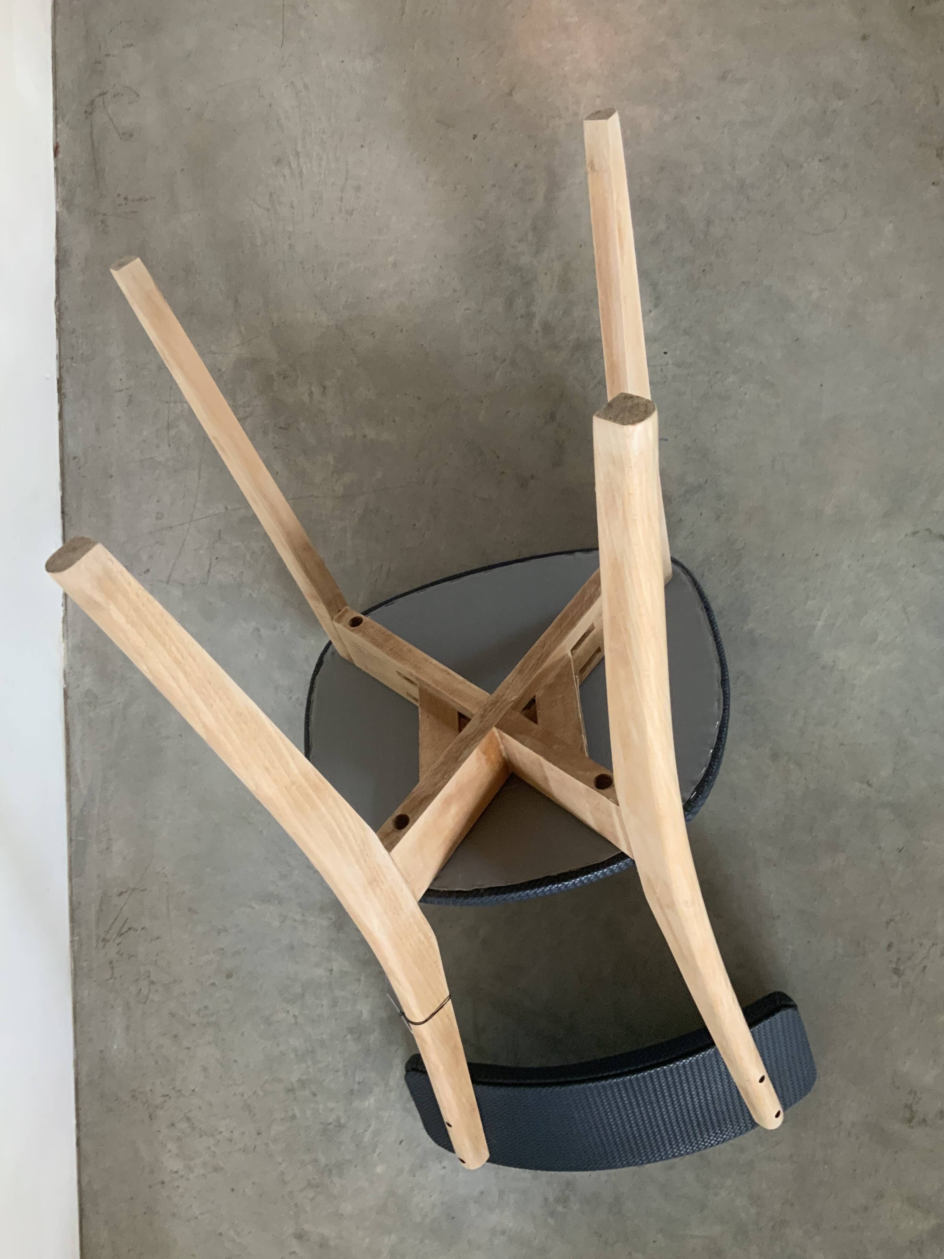 Restored vintage chair in midnight blue vinyl from the 50s