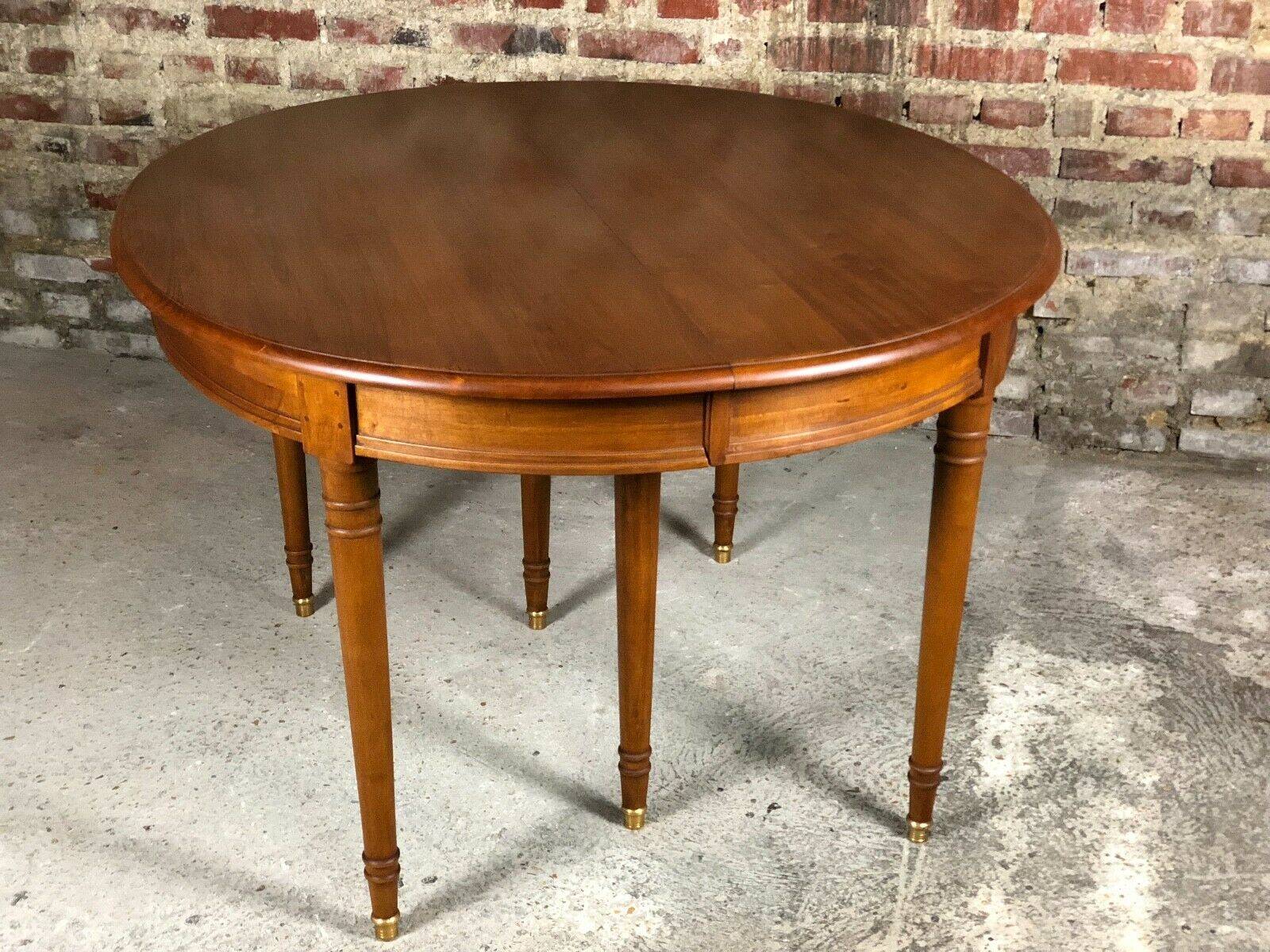 Oval walnut table with 6 legs from 1m12 to 2.94 (4 extensions of 45.5 cm)