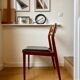 Chaise scandinave en teck et skaï noir