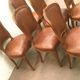 Suite de six chaises en noyer avec assises cuir, style Louis XV