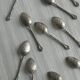 Set of 10 small silver metal spoons