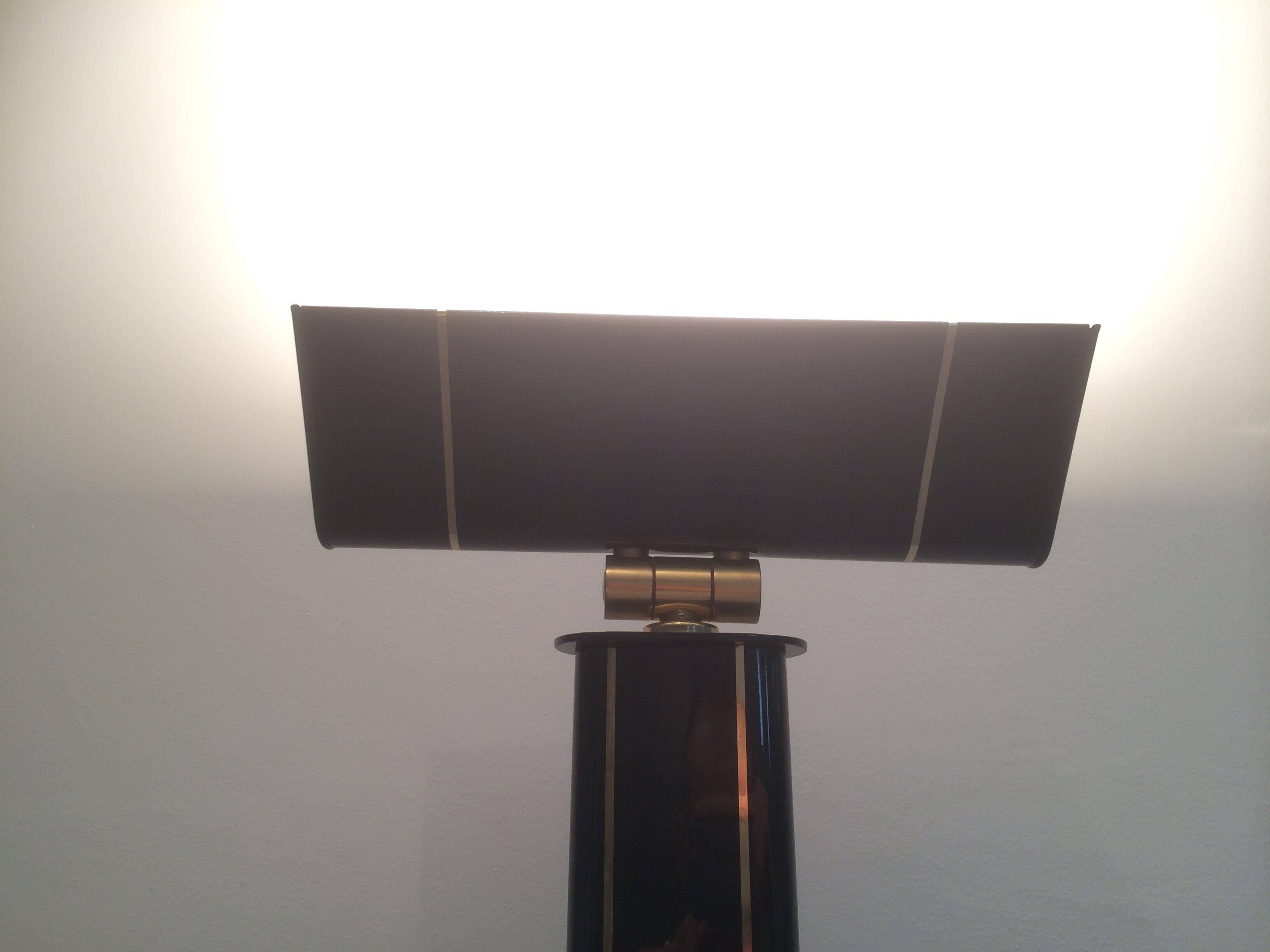 Black lacquered and brass floor lamp