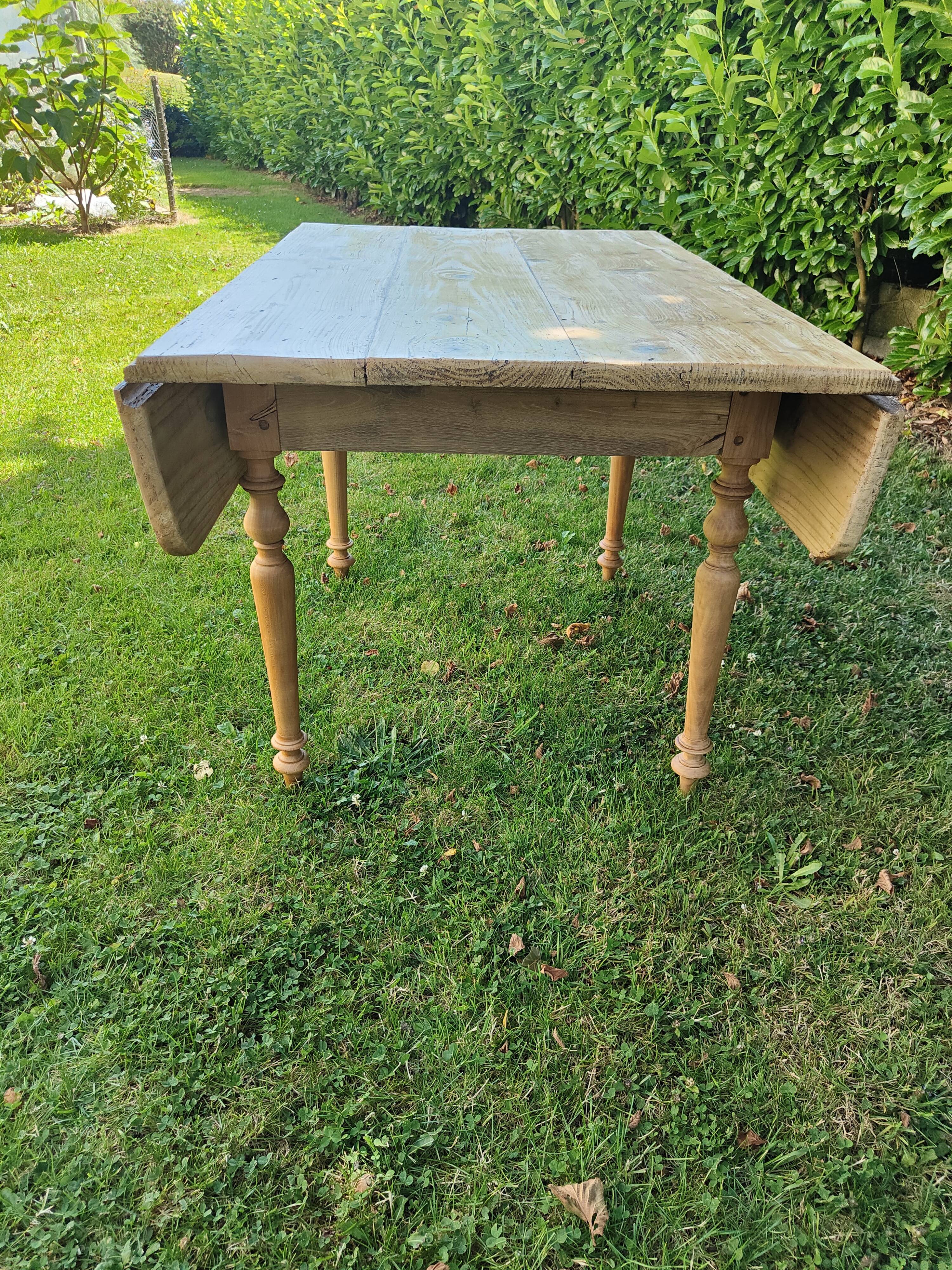 Wooden drop-leaf table