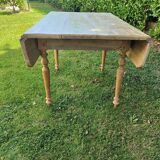Wooden drop-leaf table