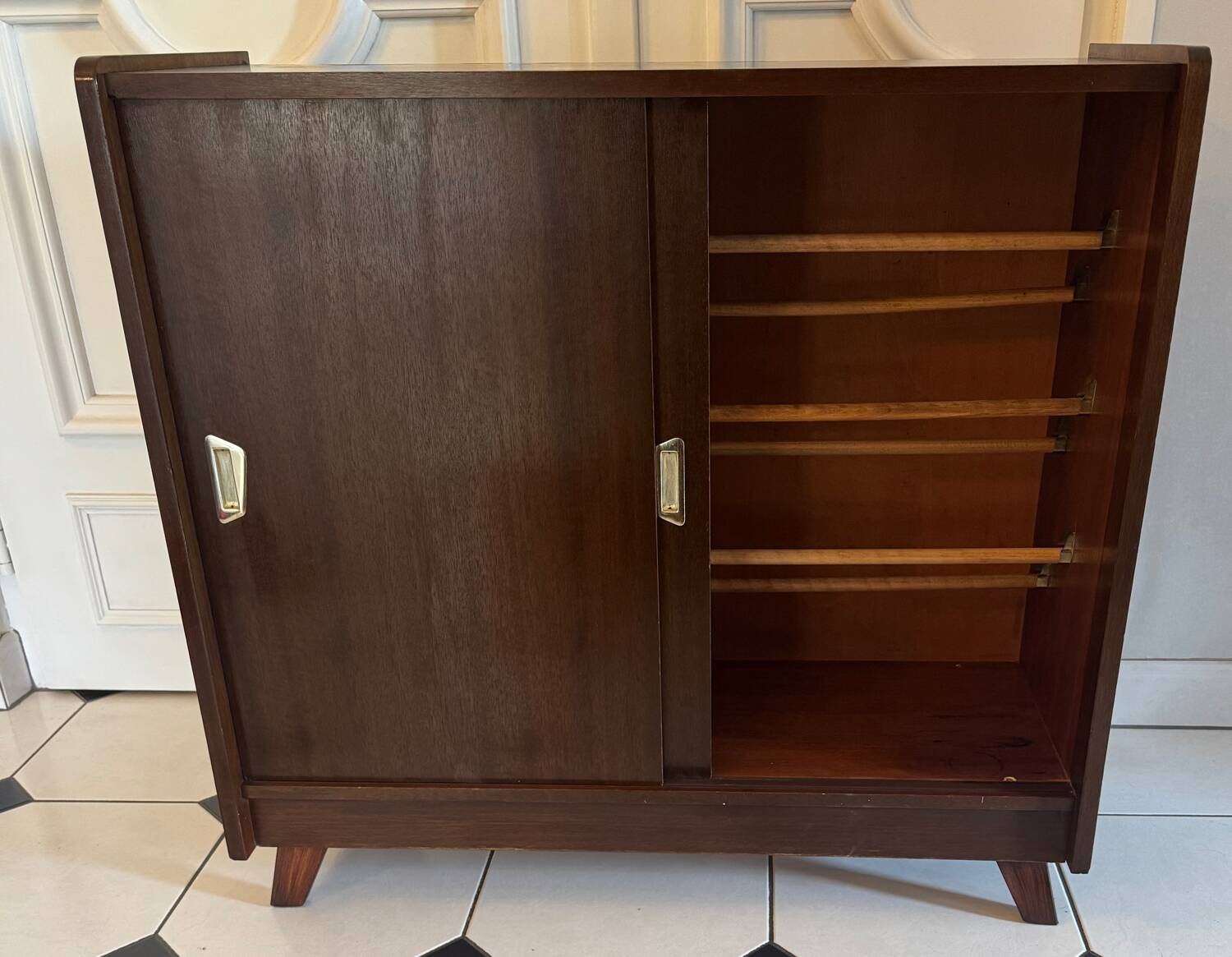 Vintage shoe cabinet with compass legs