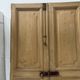 Pair of Haussmann-style double passage doors in patinated oak from the 19th century.