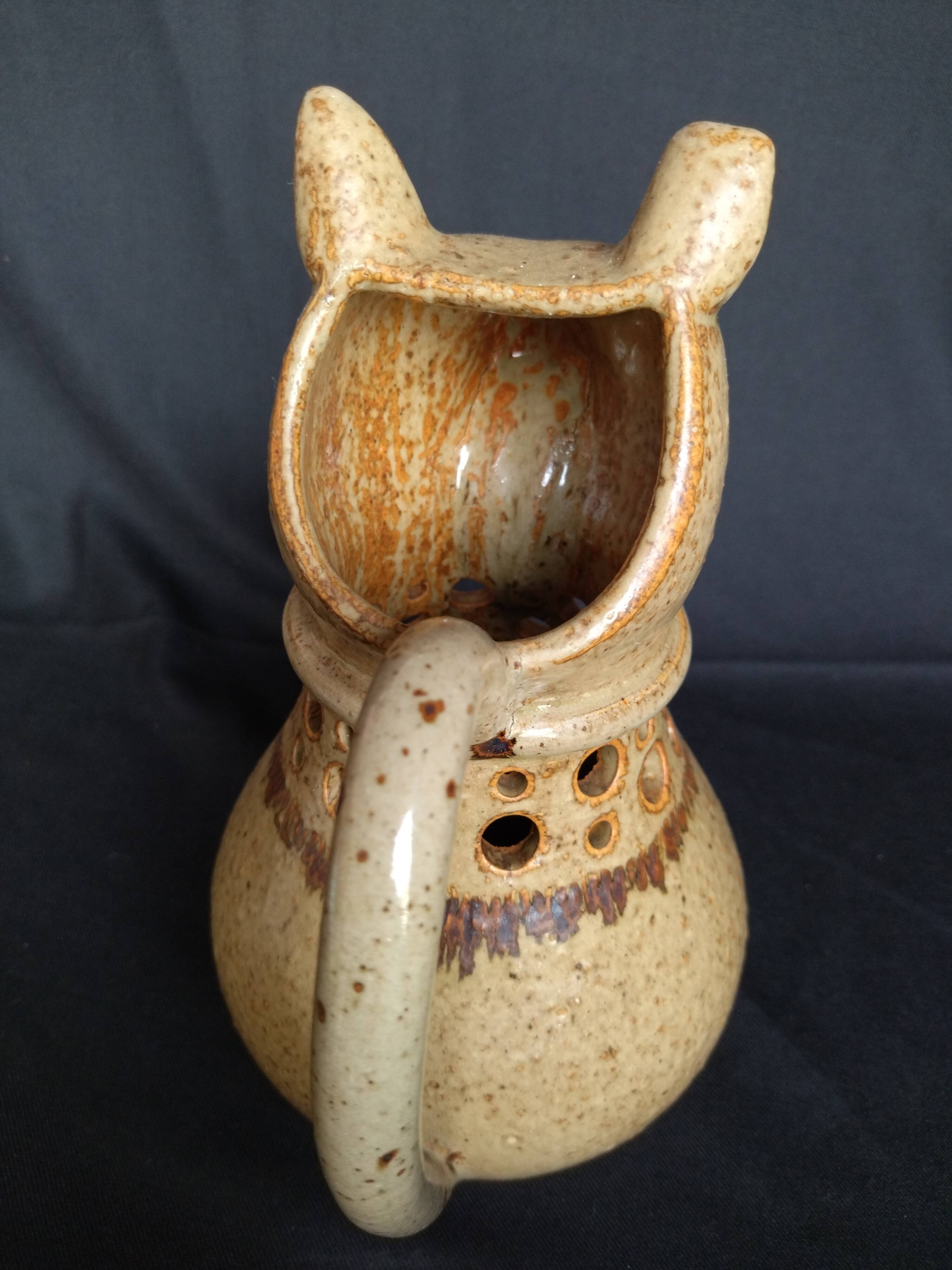 Vintage pitcher dog head