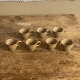 7 very small old sandstone coffee cups