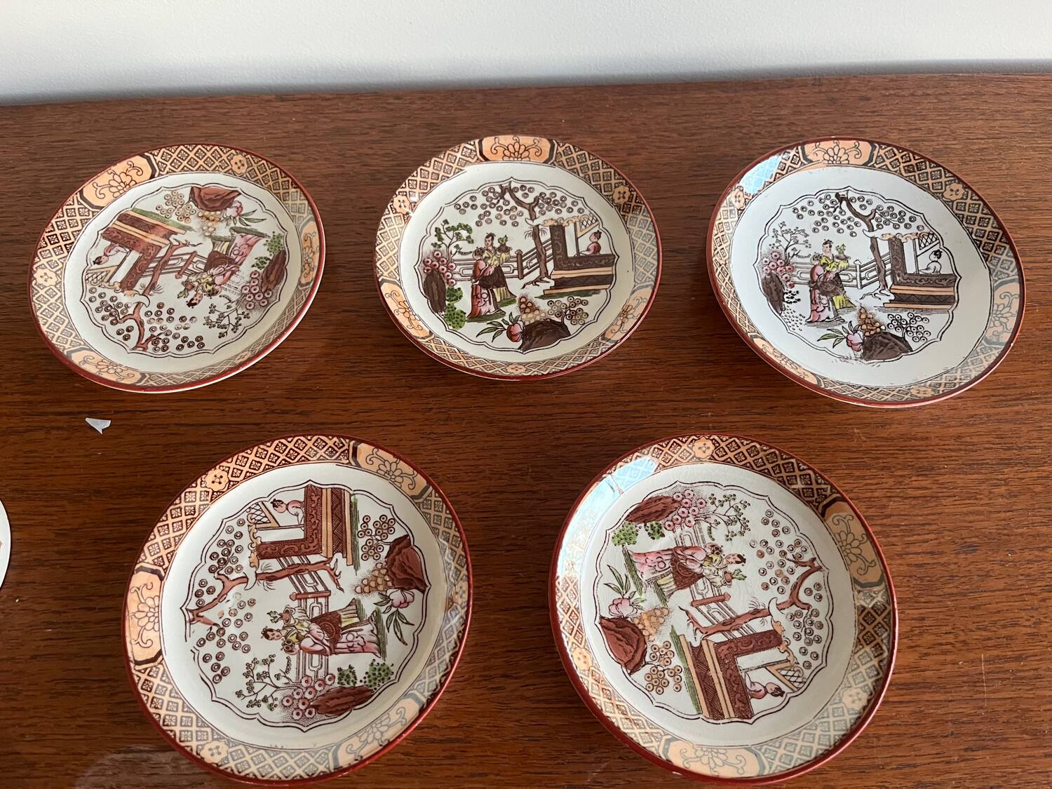 Set of 5 Sarreguemines Chinese Cups and Saucers.