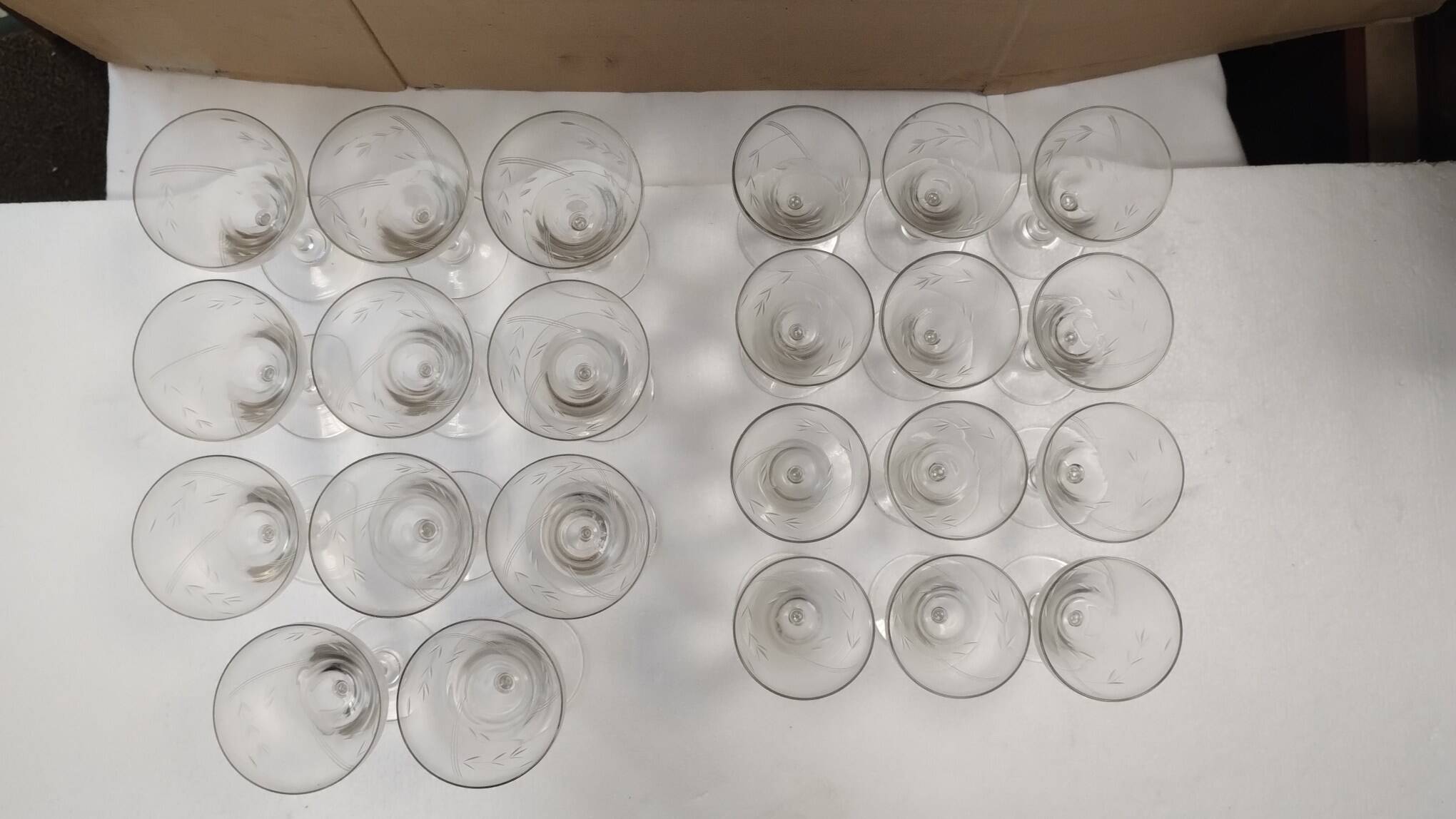 set of 23 champagne glasses or wine glasses in chiseled crystal.