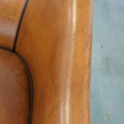 Set of 2 sheep leather club chairs finished with black piping