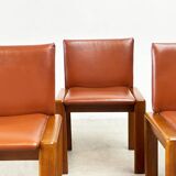 Set of six leather Italian dining chairs