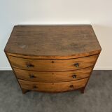 English commode from the George III Regency period, bombe shape in mahogany veneer.