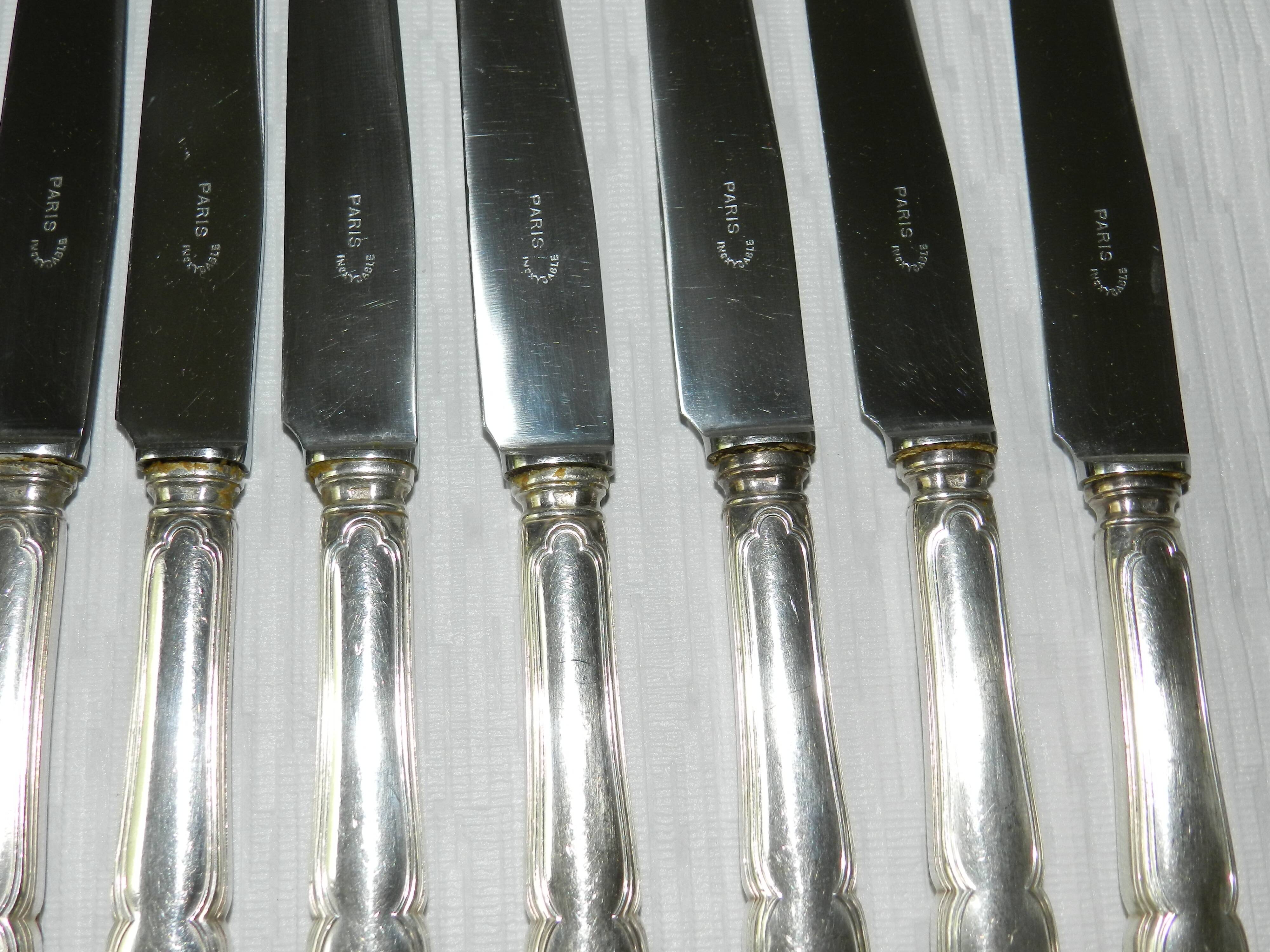 Set of 12 silver-plated metal knives