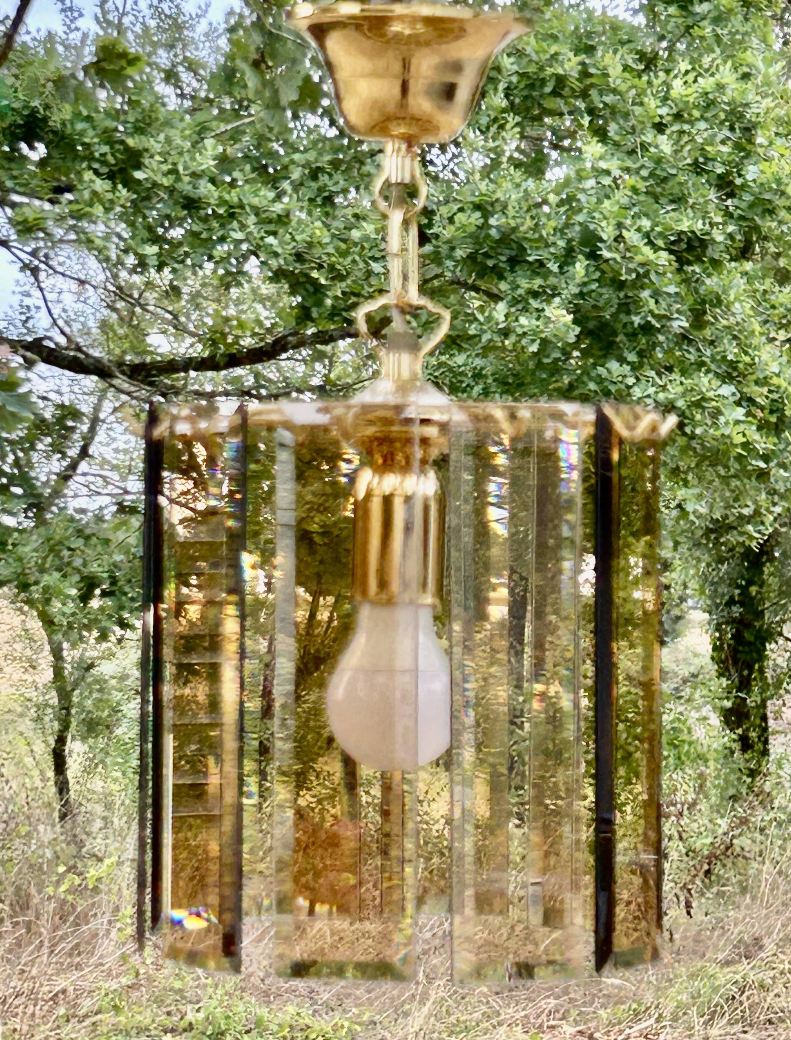 Suspension, smoked glass blade chandelier from the 1970s.