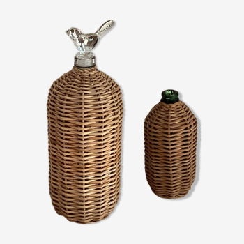 2 glass and rattan bottles