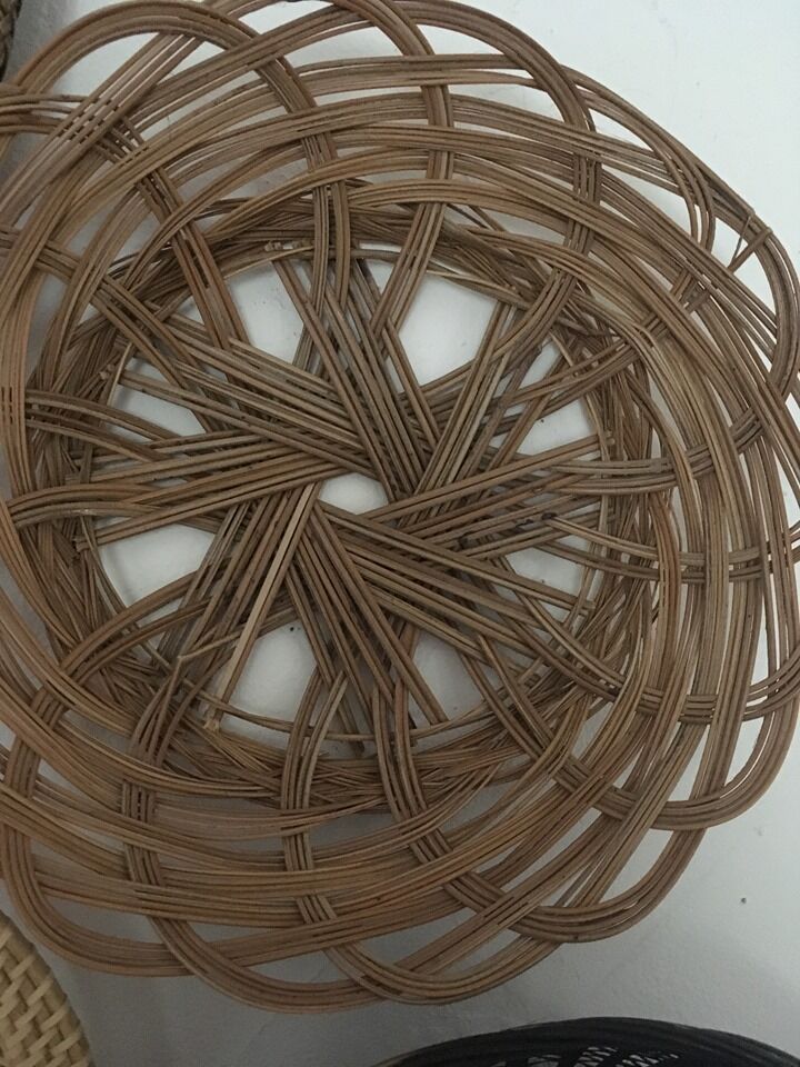 Wall composition of 8 baskets and wicker trays.