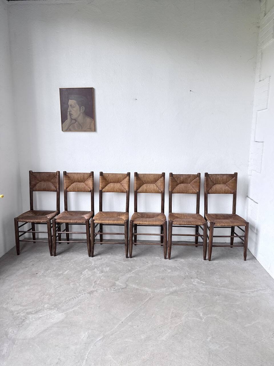 Set of 6 straw and oak Beauche chairs.