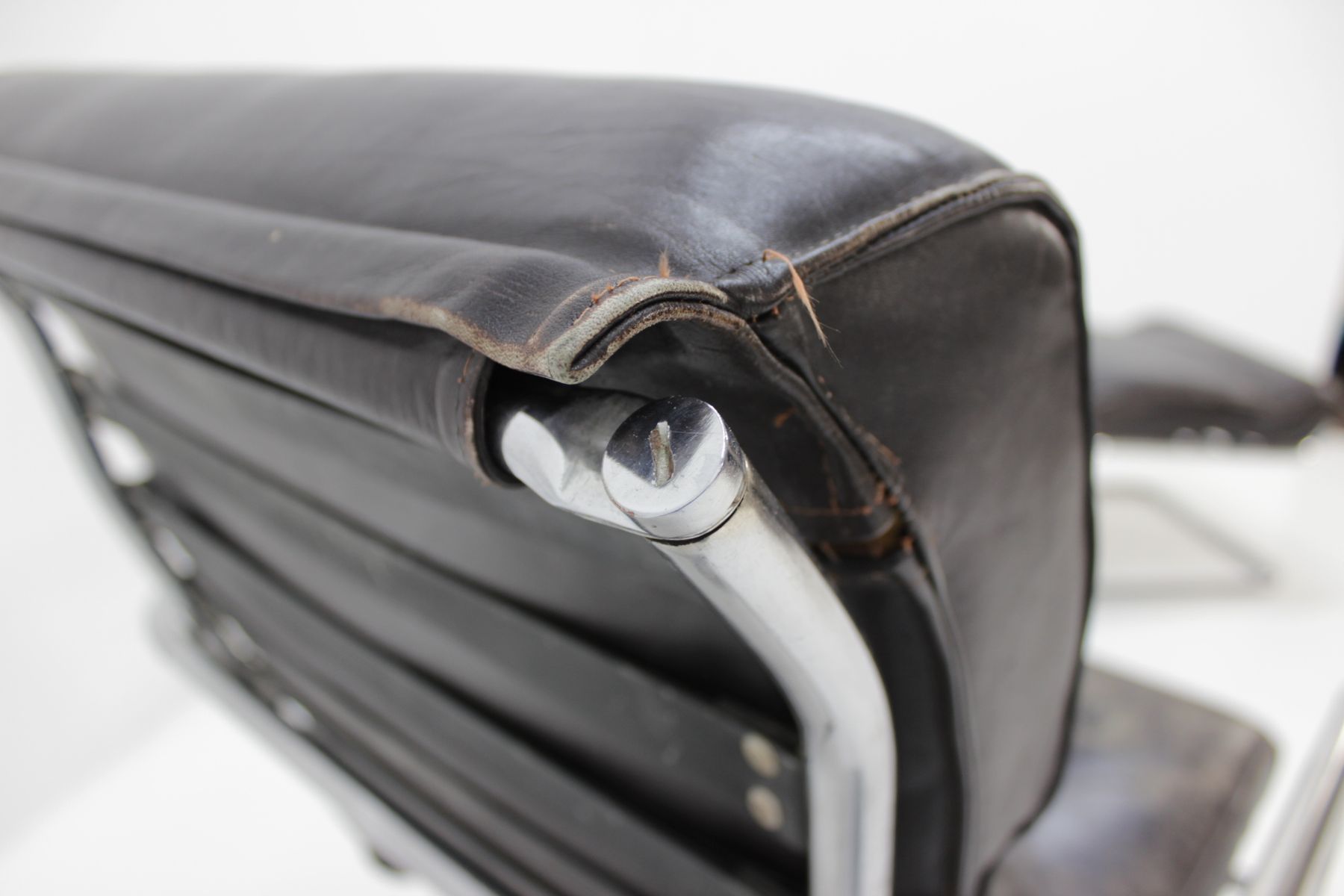 Chair and Ottoman in leather 1950 s