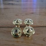 Polished brass furniture knobs
