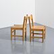 Pair of pine chairs, Maison Regain, France, circa 1970.