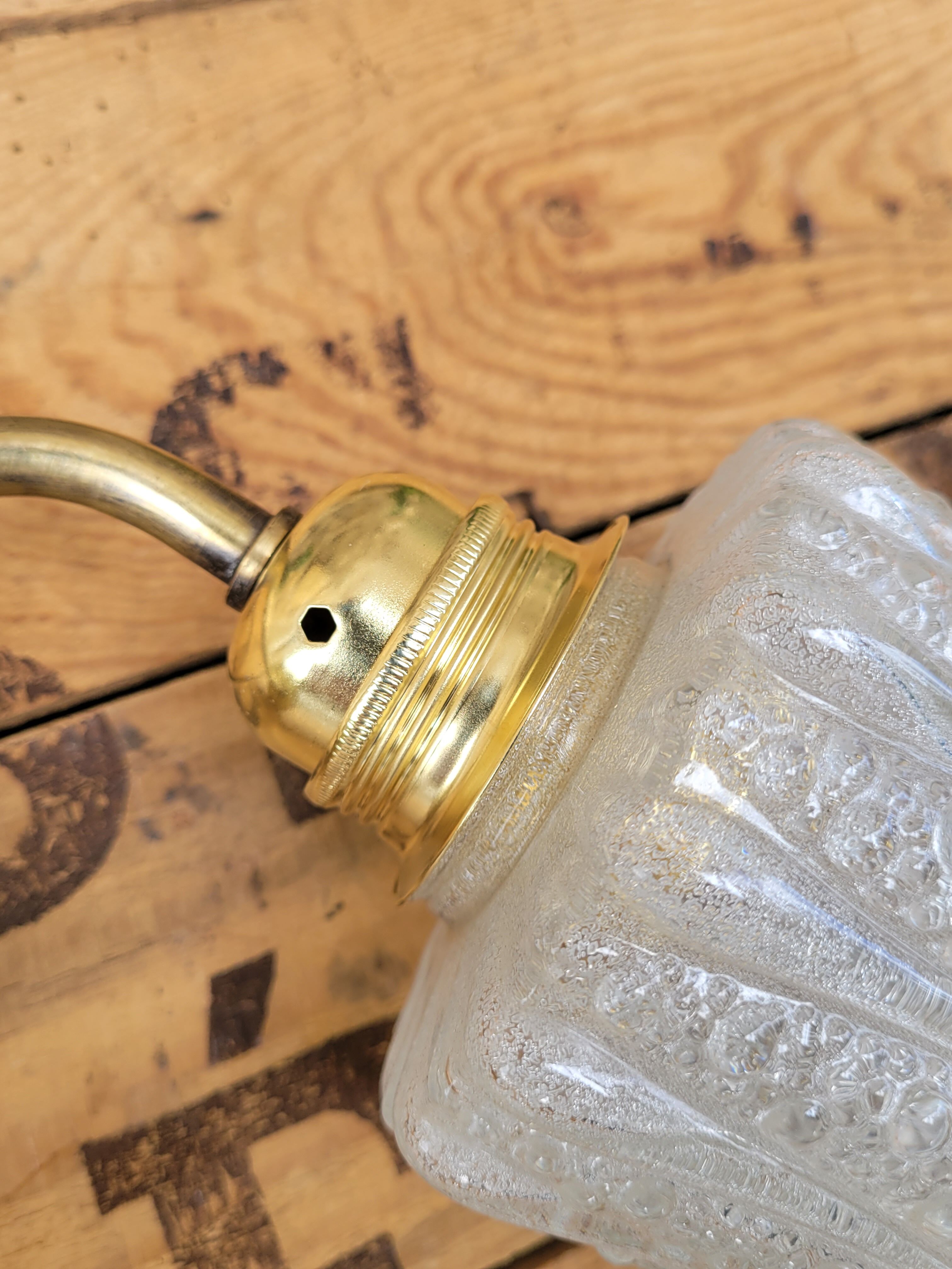 Brass and moulded glass sconce