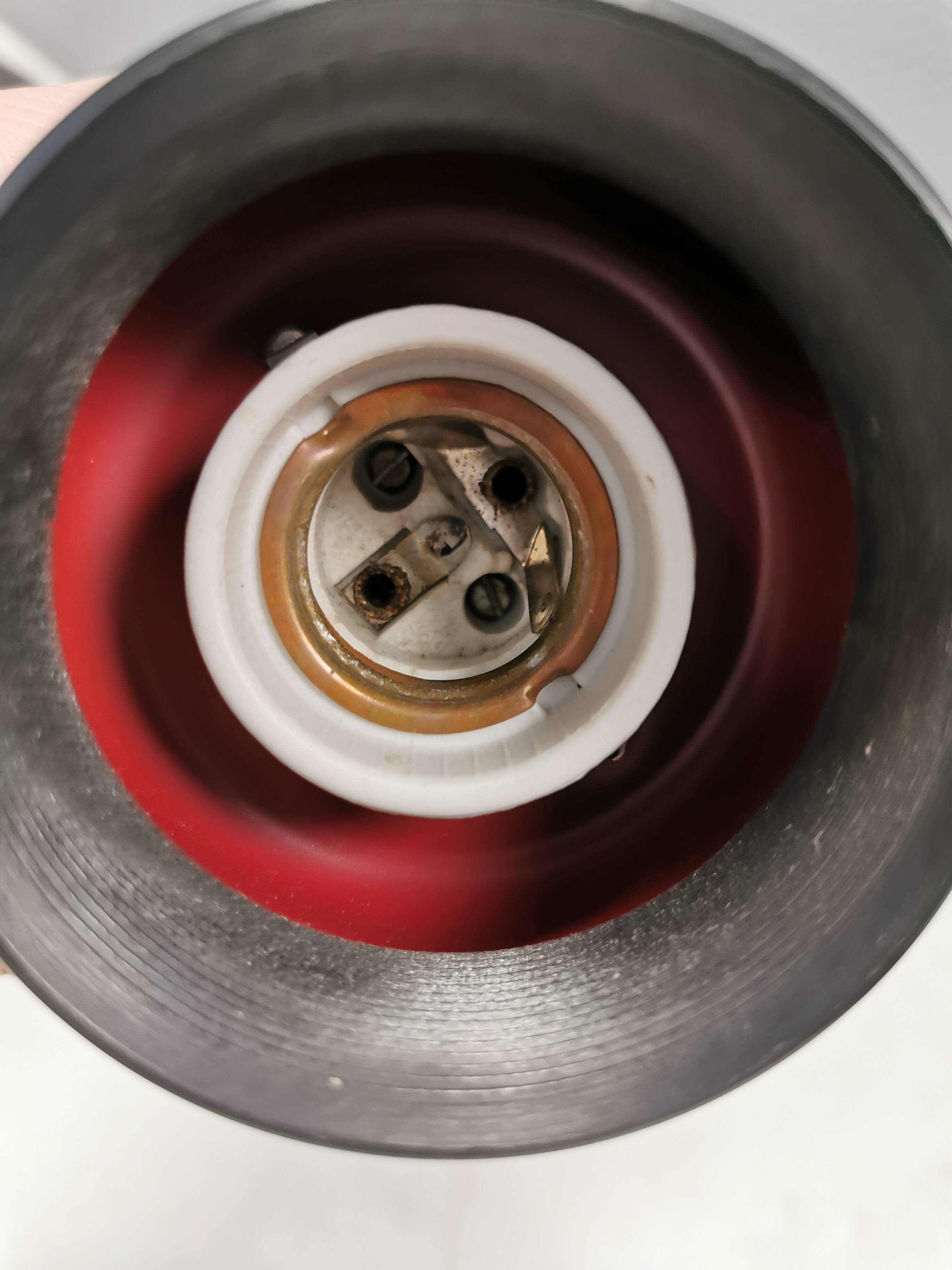 Small vintage wall lamp in hard pressed black and red plastic