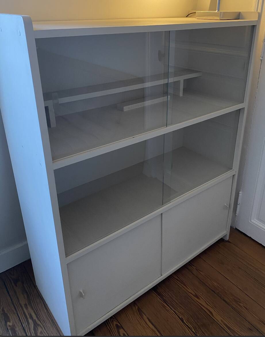 Beige wooden bookshelf