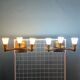 Maison cheret, pair of 3-light wall lights in ronze, brass and glass, circa 1950/1960
