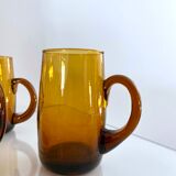 4 mugs/ mugs in vintage blown amber glass