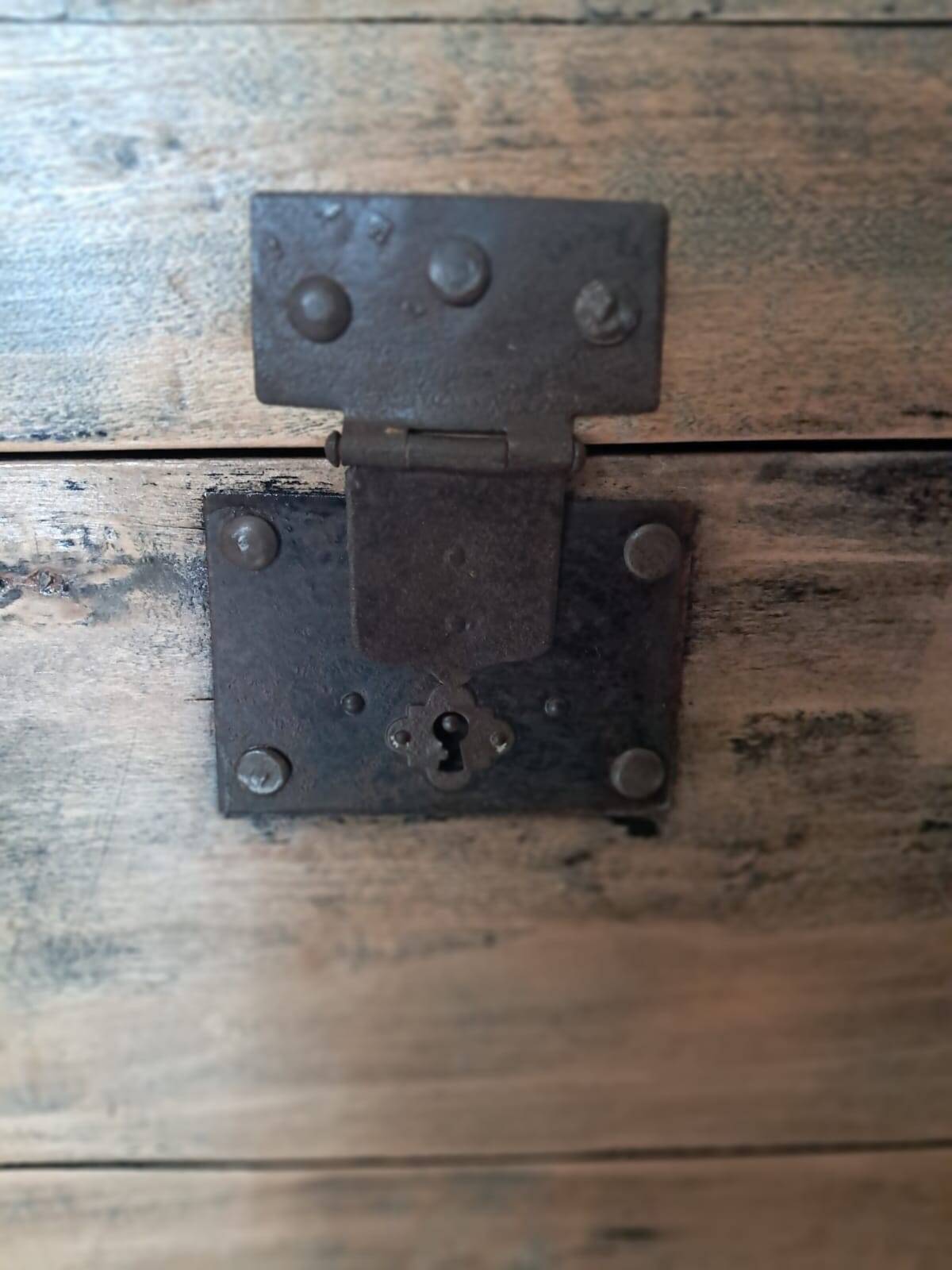 Antique curved wooden travel trunk