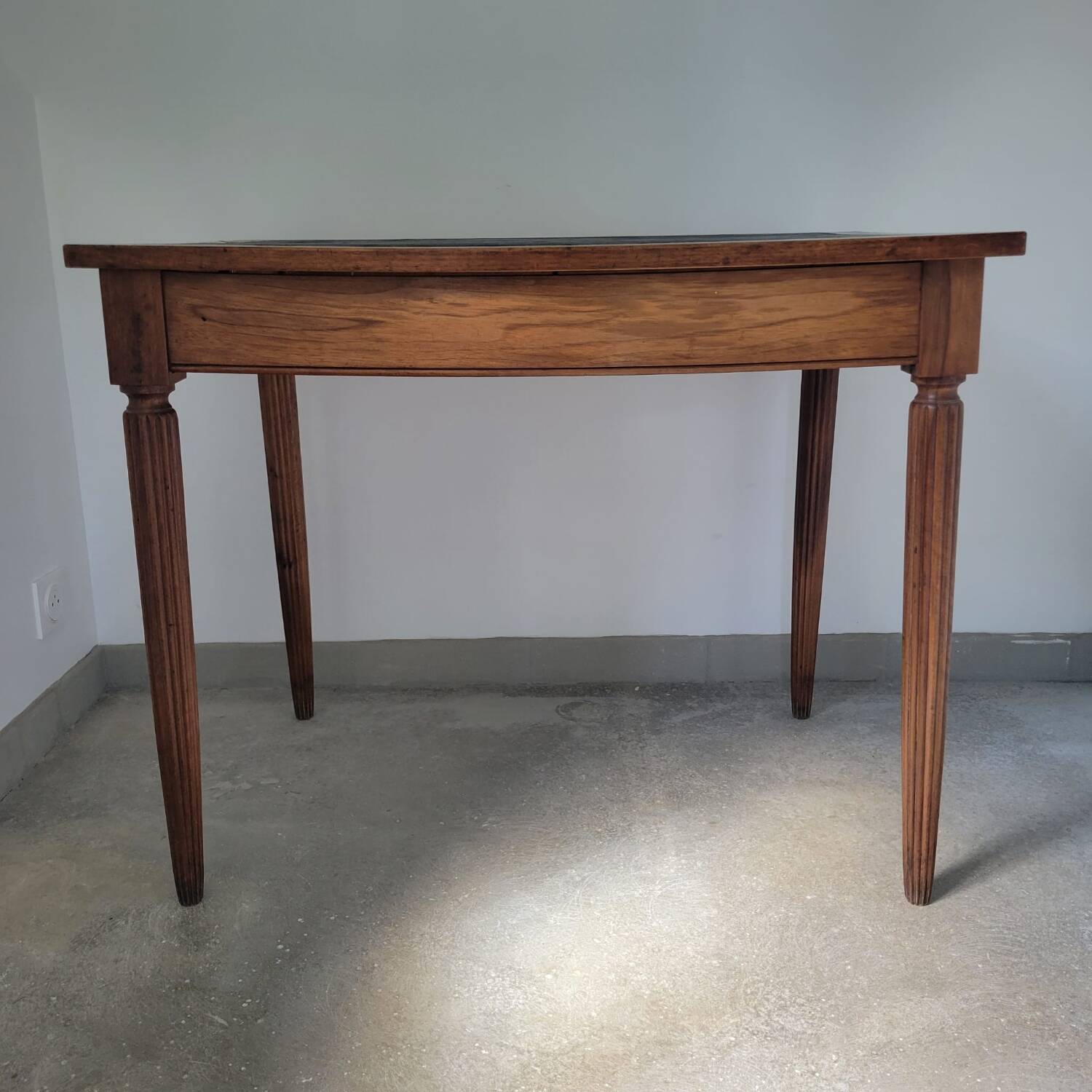 Antique desk made of solid wood and leather.