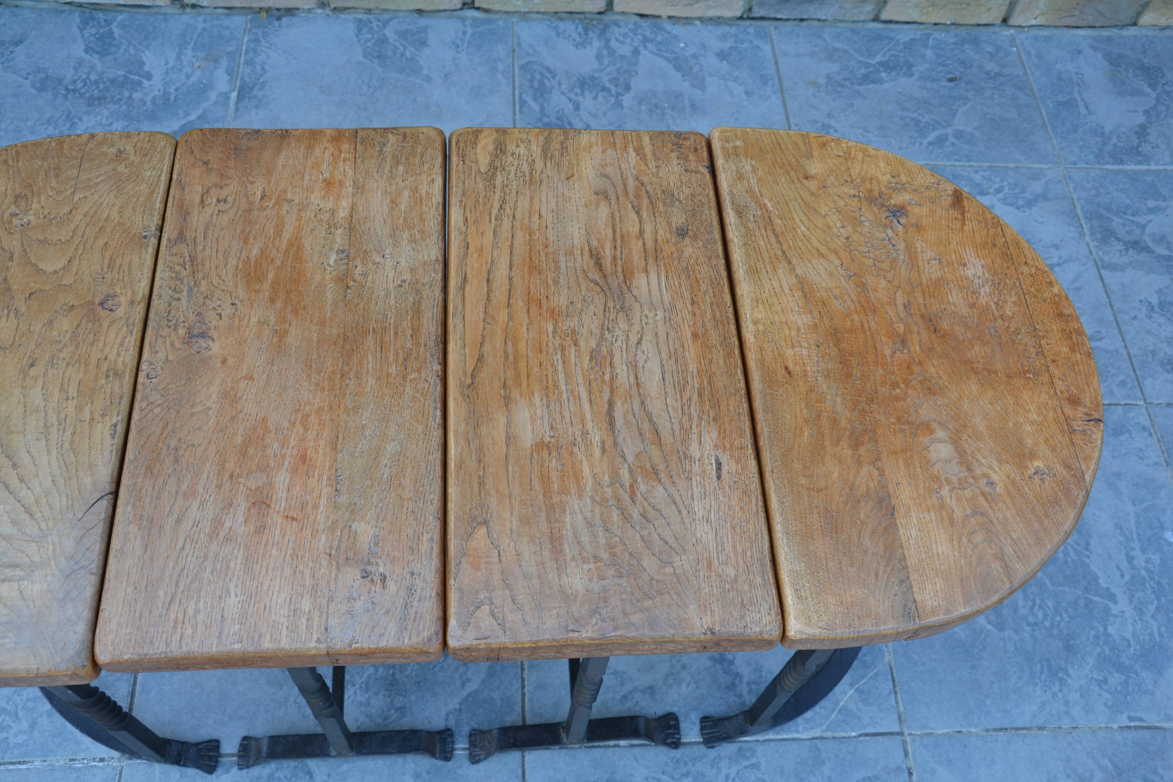 Unusual modular coffee table in oak and wrought iron.