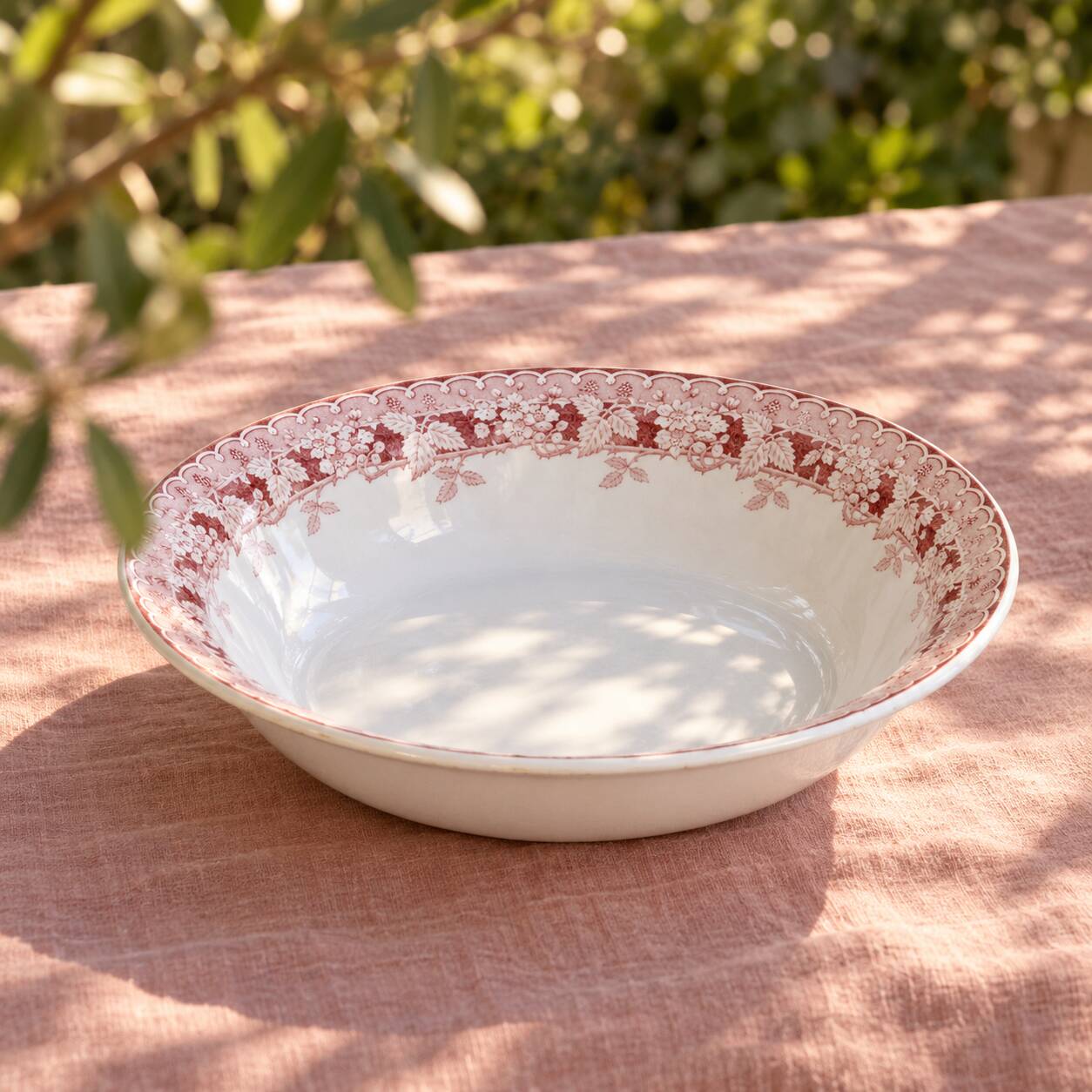 Pink ironstone salad bowl signed St Amand, Mûrier collection.