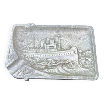 Old ashtray representing a steamboat