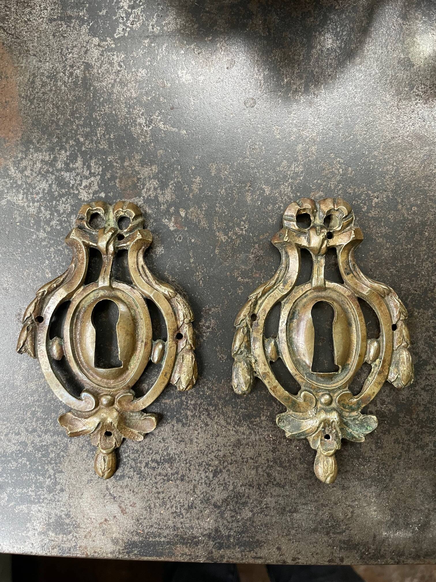Pair of bronze lock entries, Louis XVI period