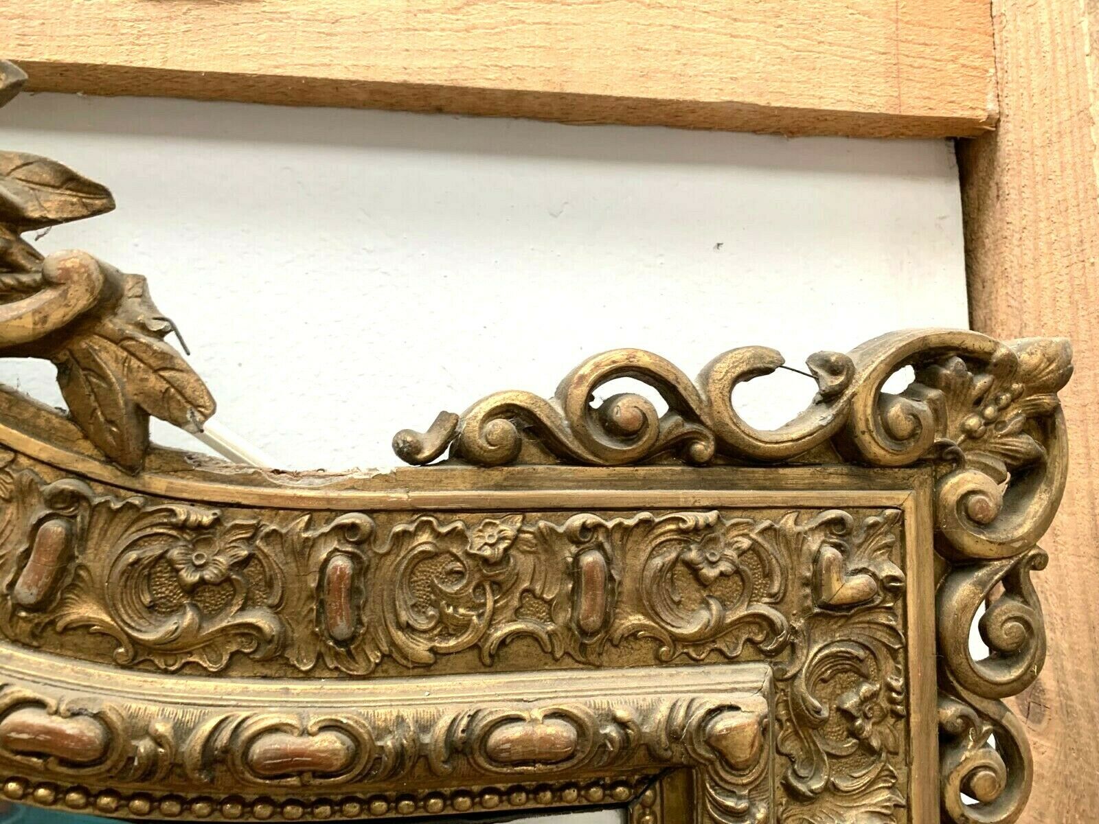 20th century Louis XV style mirror in wood and gilded stucco